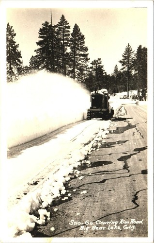 Snowplow clearing rim road - clearing,